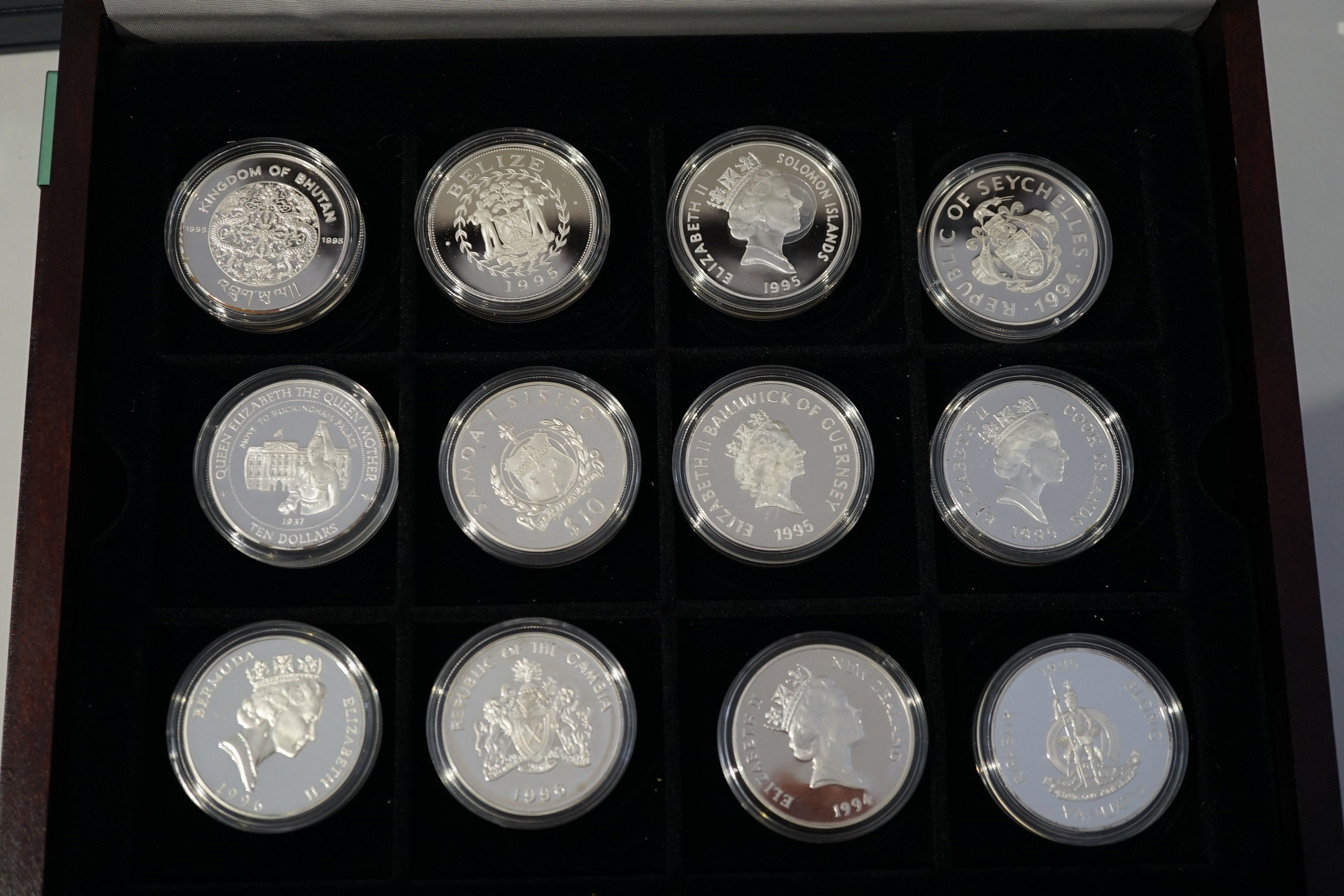 British and Commonwealth commemorative coins, MDM Crown collection HM Queen Elizabeth the Queen Mother, 40 proof silver coins, 28.28 to 41.47g, two cases with album of certificates